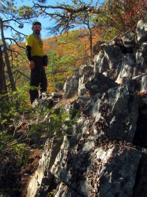 John resting as we find a small level spot on the climb back up 
