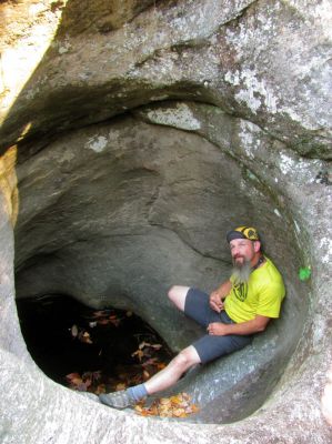 The gnome makes himself at home in one of the potholes 

