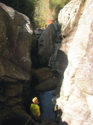 John finally emerges from the Little Rat Crack and admires being in the gut of the upper slot canyon 
