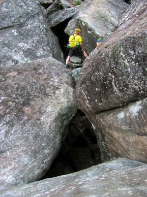 John Forbes and Thomas Mabry negotiating some boulders within the gorge 
