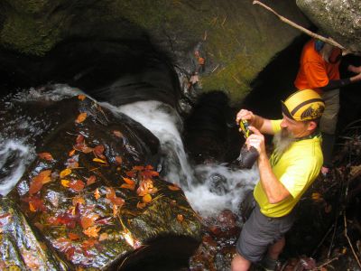 standing at the base of the slot canyon falls 
