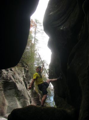 a happy gnome poses within the slot canyon of Bonas Defeat 
