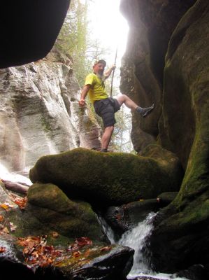 a happy gnome poses within the slot canyon of Bonas Defeat 
