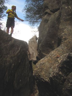 John high above on top of the blockage rock. You can see the log wedged in the top right 
