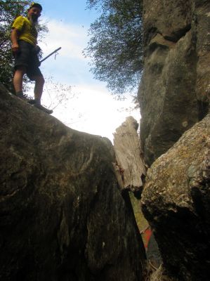 John high above on top of the blockage rock. You can see the log wedged in the top right 

