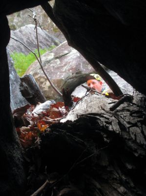 Another keyhole crack we had to squeeze thru . You can see Johns face on the other side ! 

