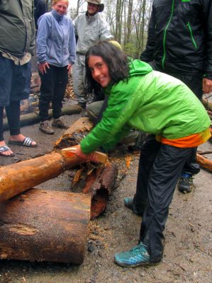 The coolest kid in the world sawing wood ! 
