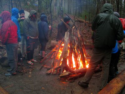 After the Sat evening feast, a huge fire was built. Keep in mind it never stopped raining. 
