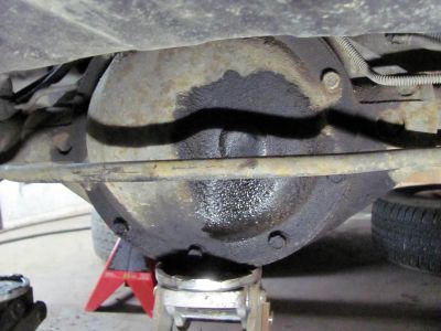 Rear differential drain plug (if you can call that rubber pos that) leaking so I replaced it with new one and topped off rear end grease as axle grease seals were leaking into the breaks. I will be rebuilding the rear end soon as it has been roaring since I bought it. 
