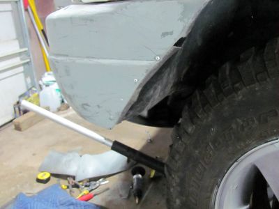 I reused the cut pieces and riveted  them back to the trimmed bumper corners so I would have a nice edge instead of a narrow cut one and a way to mount the inner fenders back to it. I would epoxy glue those later in this process for stability as those rivets would never last by themselves under off roading conditions. 
