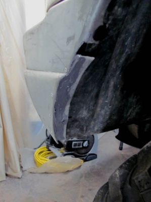 Epoxy applied to the driver side corner piece I made and riveted on 
