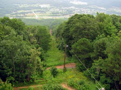 Looking down power lines from tower
