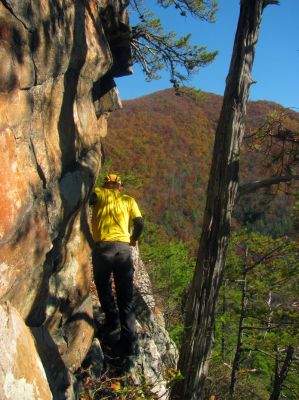 John makes his way along the ledge to get back to the point 
