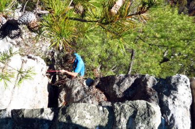 Tyler on his first descent of  the crack using the rope and harness he rigged up (Taken with my larger camera) 
