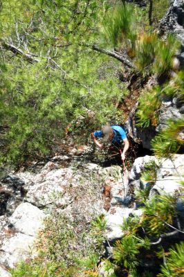 Tyler on his first descent of  the crack using the rope and harness he rigged up (Taken with my larger camera) 
